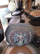 Load image into Gallery viewer, Symmetrical Drumming V3 - Duffel Bag (Grey) - Large kit bag sitting on drums holding drumsticks and sheet music - end view - Keen Eye Design
